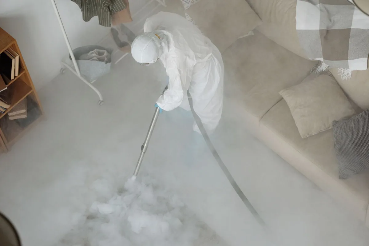 Biohazard cleanup technician in protective equipment, Bountiful, UT
